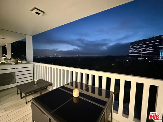 a balcony with a bench