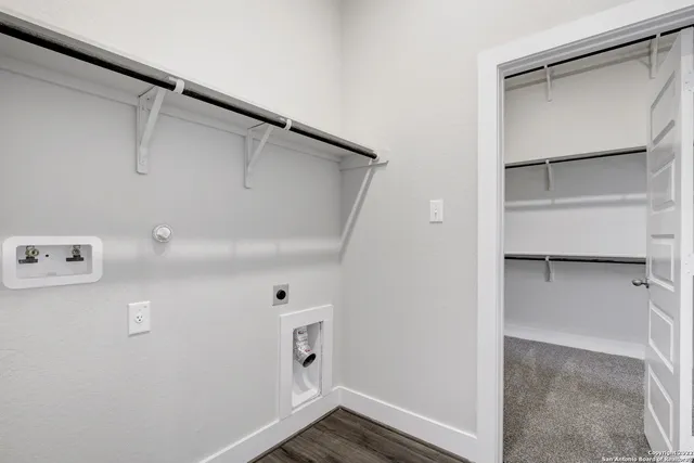 a view of a room that has a large window