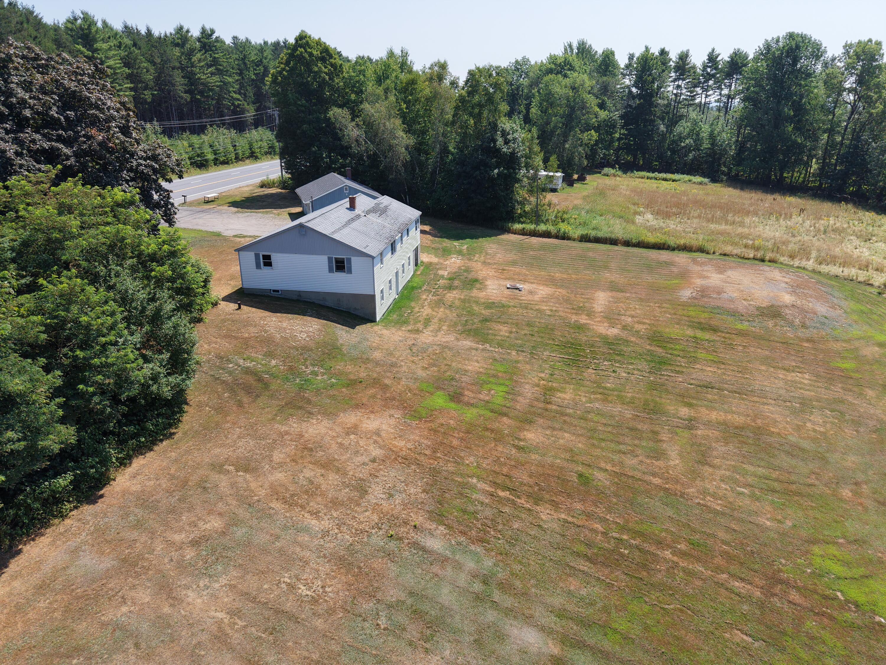 338 Lakewood Road Madison, ME 04950 - Photo 37 of 43 DJI_20250813123300_0004_D