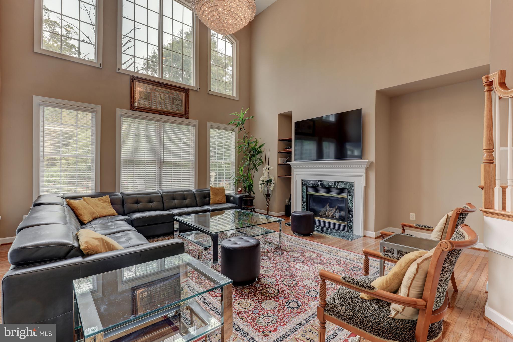 7394 Spring Summit Road Springfield, VA 22150 - Photo 11 of 69 2 story great room lots of natural light