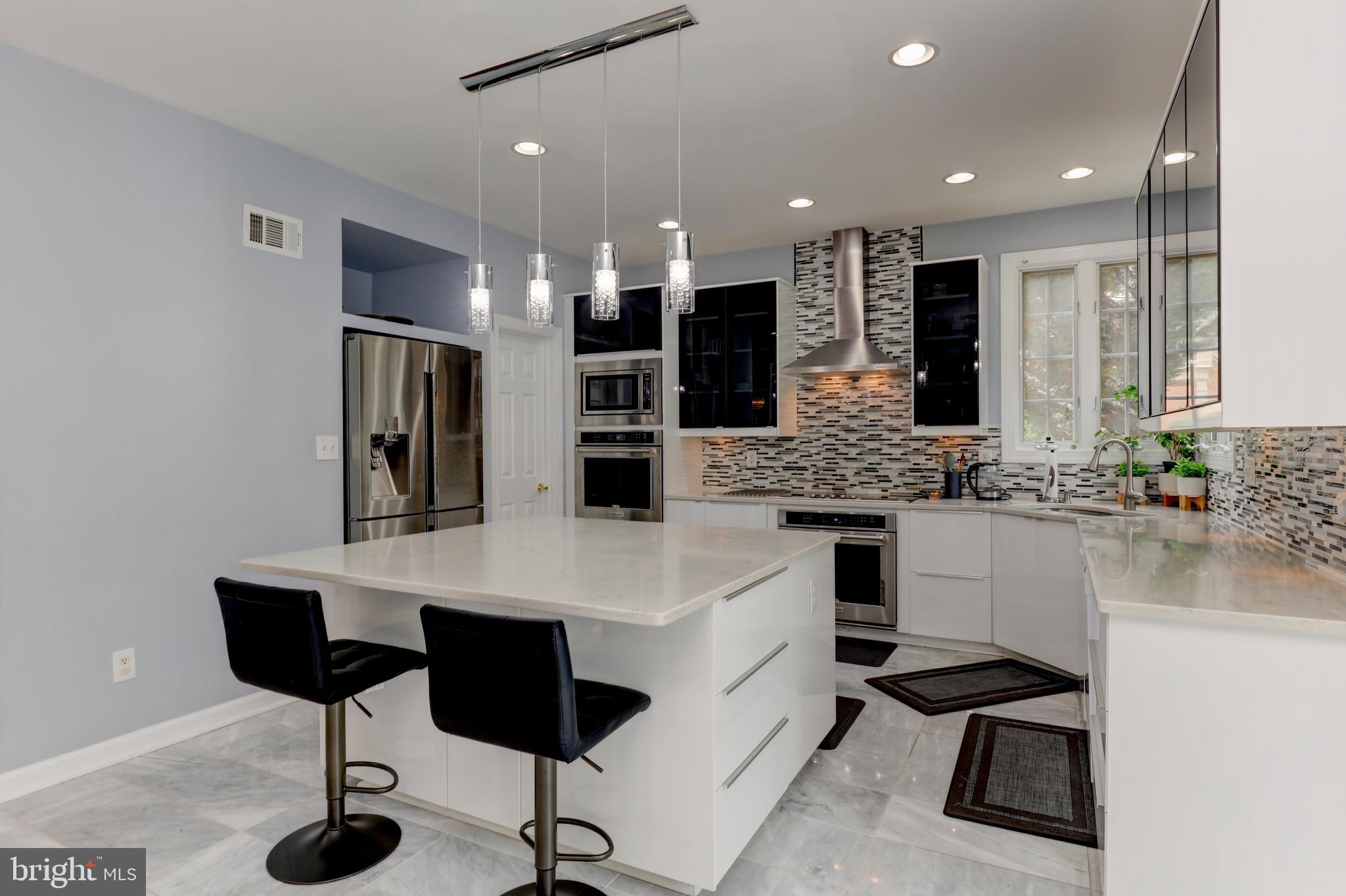 7394 Spring Summit Road Springfield, VA 22150 - Photo 14 of 69 large island with base cabinets drawers
