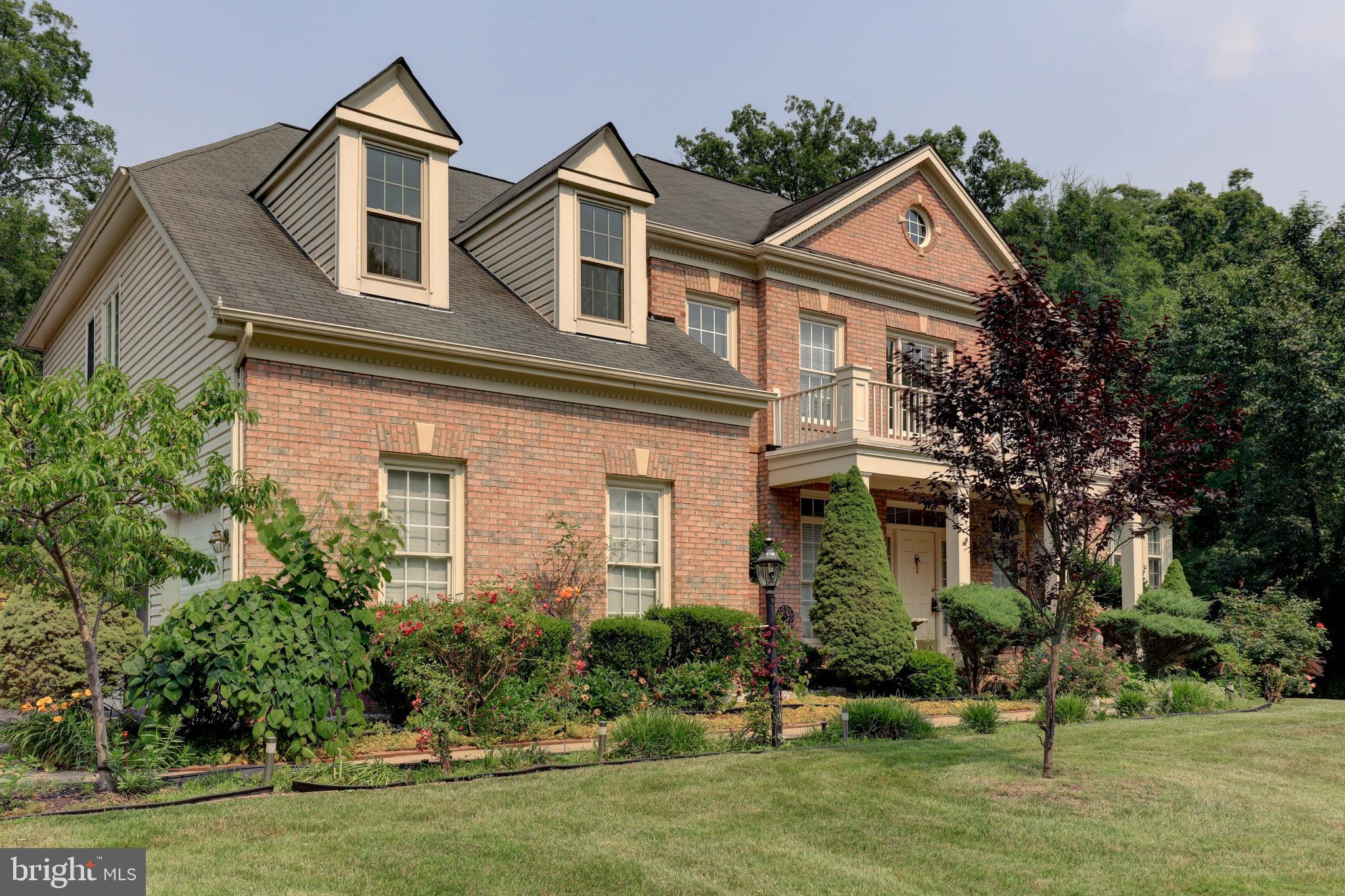 7394 Spring Summit Road Springfield, VA 22150 - Photo 3 of 69 side load garage