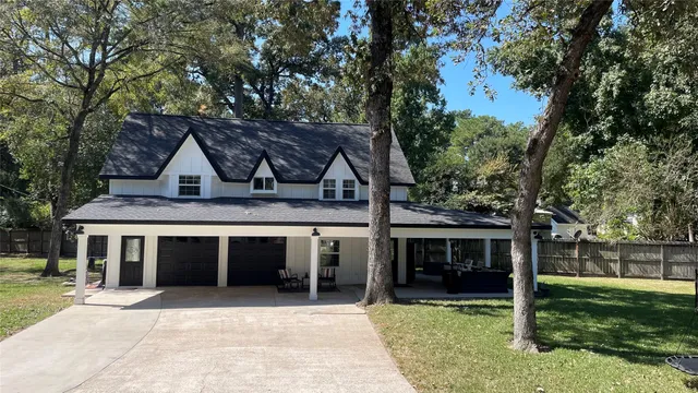 a view of house with yard