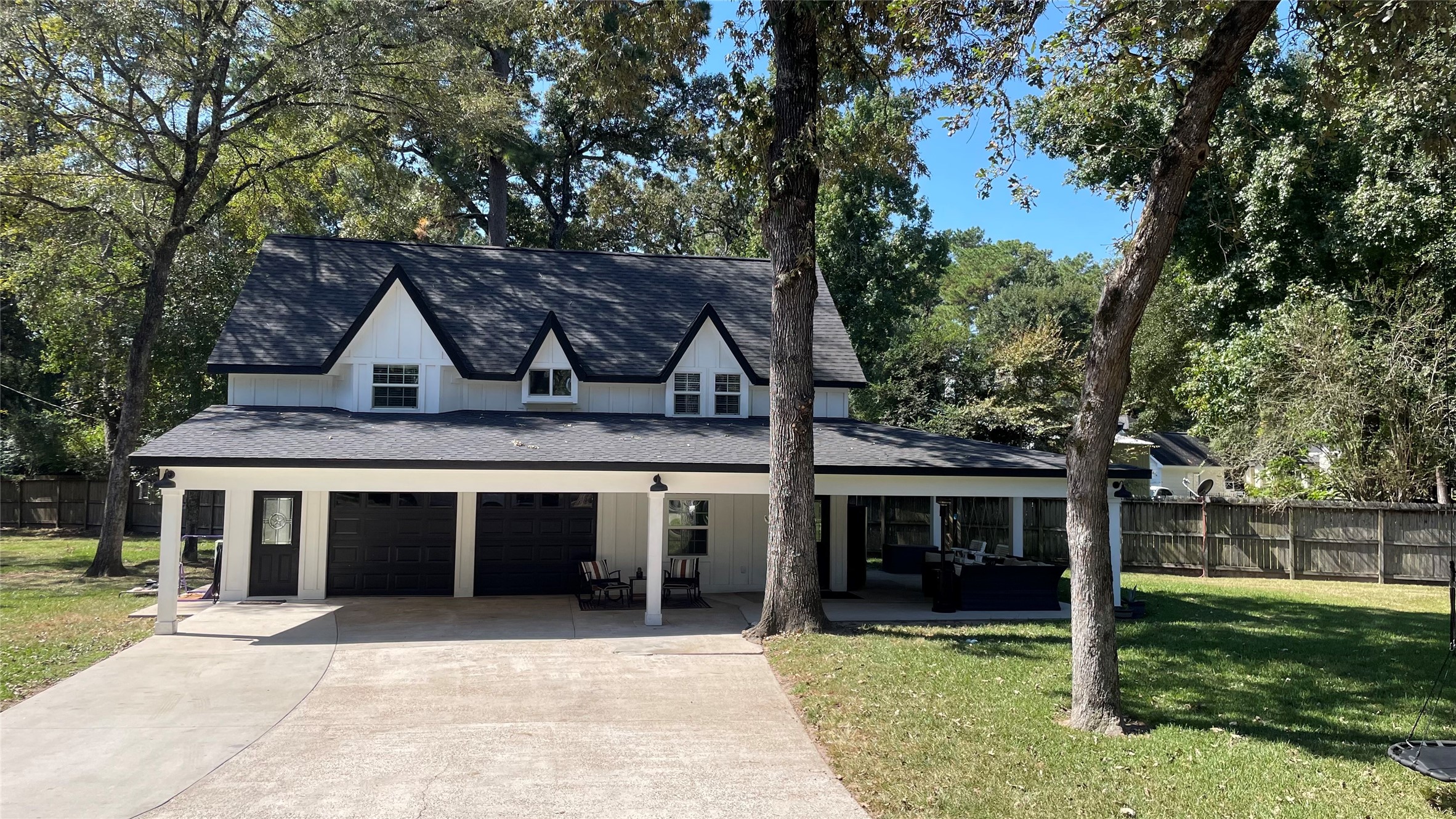 a view of house with yard