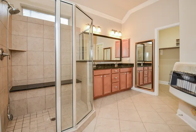 a kitchen with stainless steel appliances a refrigerator and a sink