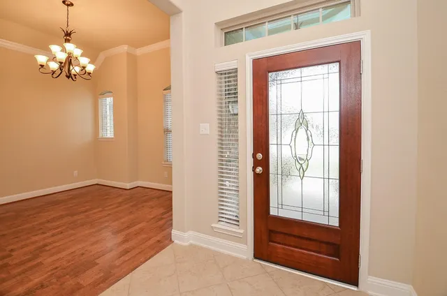 a view of front door with hallway