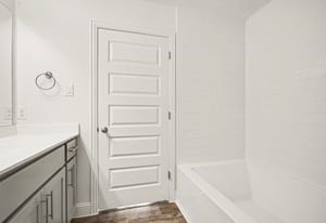 19 Greenbriar Loop Angleton, TX 77515 - Photo 10 of 19 Primary bathroom featuring a large tub/shower combo.