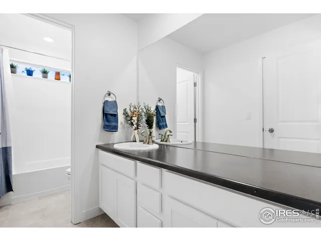 a room with furniture and a window