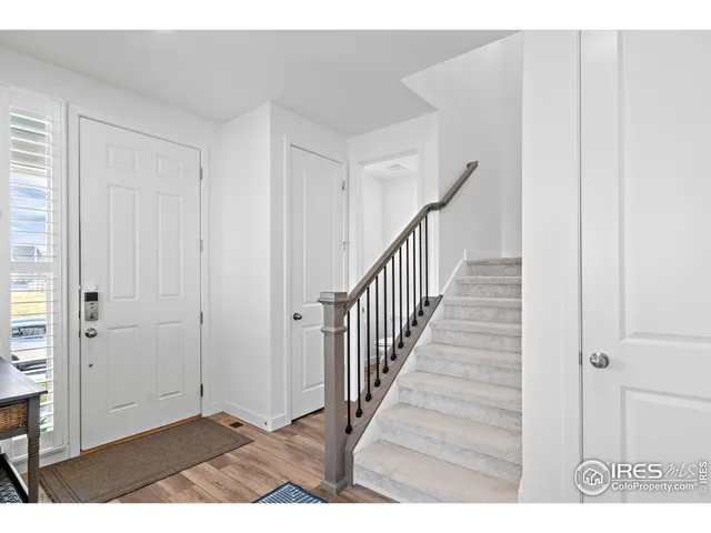 a view interior of a house with wooden floor and stairs