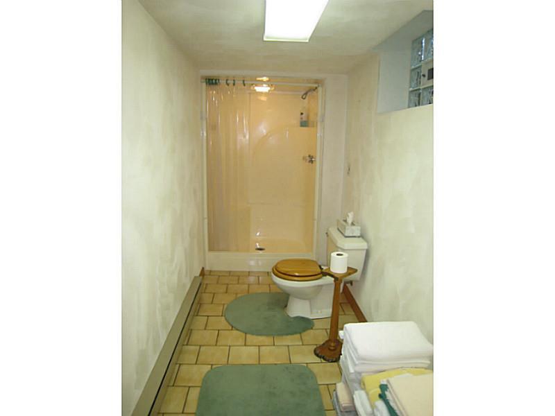 2833 Italy Road Export, PA 15632 - Photo 15 of 23 Full Bath. Full bath with walk in shower and ceramic tile flooring.