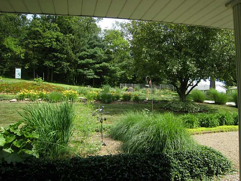 2833 Italy Road Export, PA 15632 - Photo 20 of 23 Exterior Back. Beautiful backyard and landscaping.