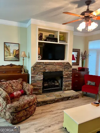 a living room with furniture and a rug