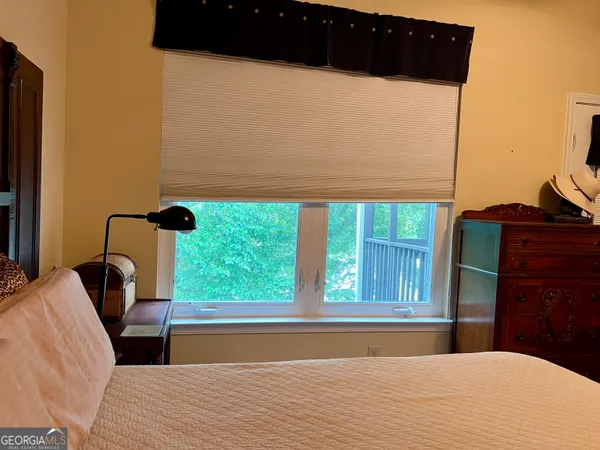 a room with lots of different colored cloths