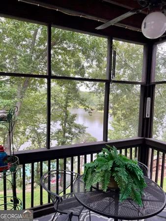 a view of a porch with a yard