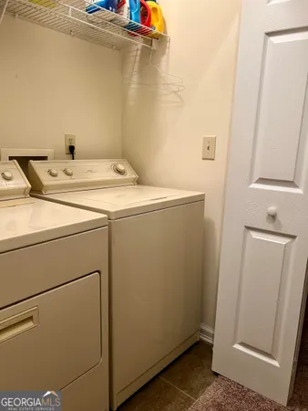 a backyard of a house with lots of trees