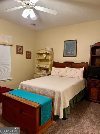 a view of balcony with wooden floor and fence