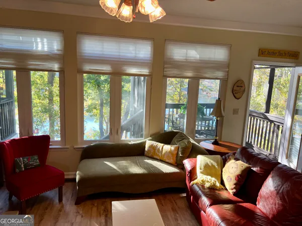 a kitchen with stainless steel appliances granite countertop a refrigerator a stove and a sink