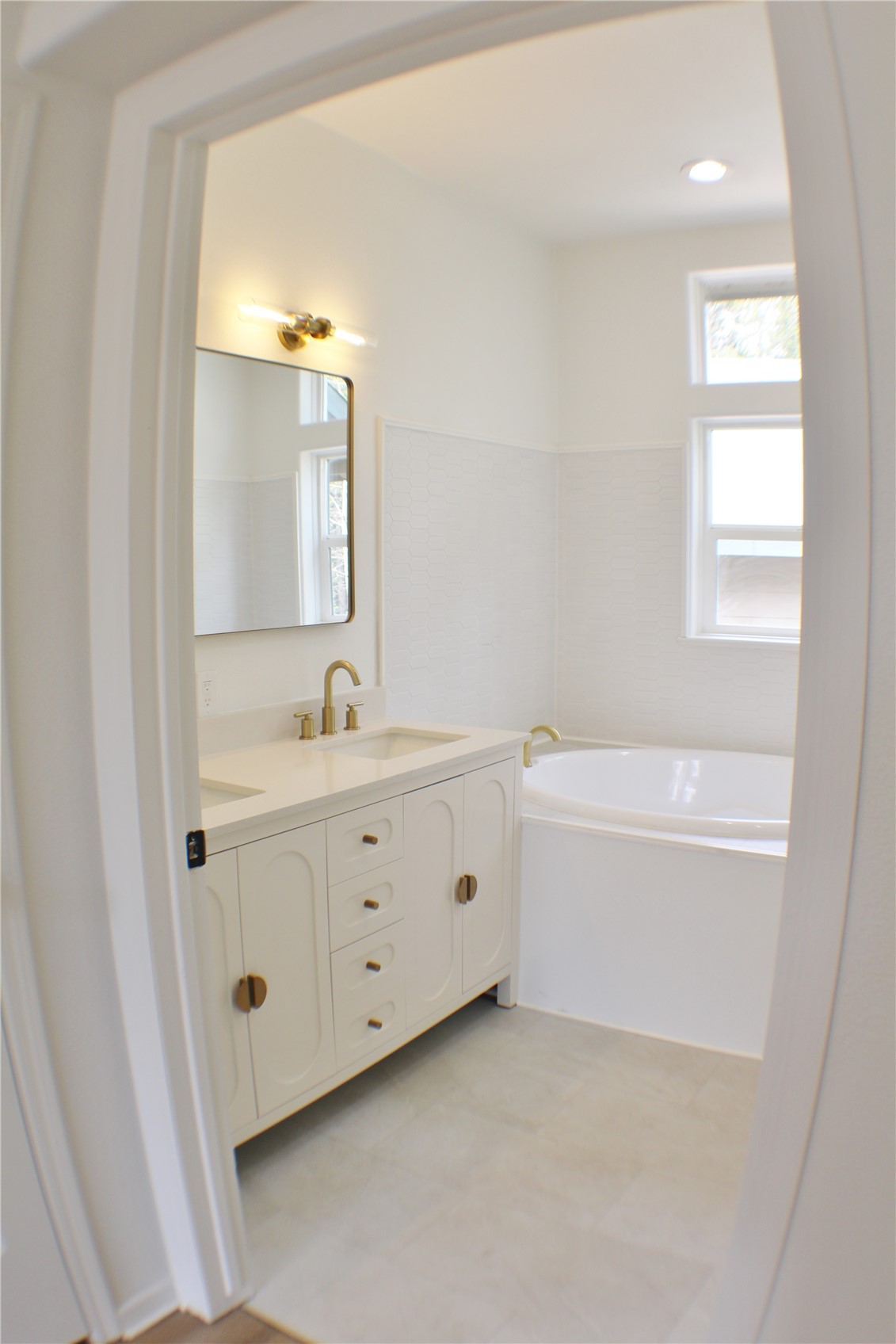 2095 Mullenville Road Fairplay, CO 80440 - Photo 11 of 22 a spacious bathroom with 2 sink tub and a mirror