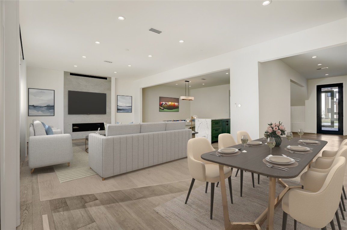 6533 Corbin Street Houston, TX 77055 - Photo 12 of 50 a living room with furniture and a flat screen tv