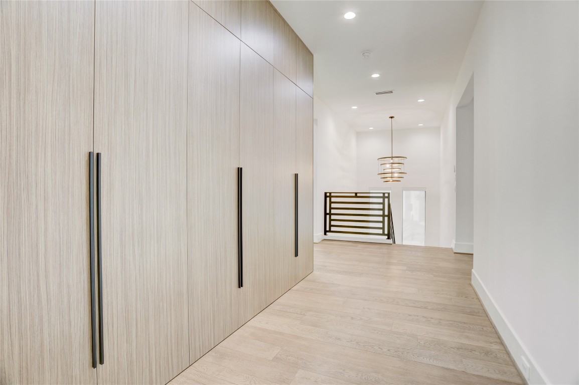 6533 Corbin Street Houston, TX 77055 - Photo 28 of 50 a view of a hallway with stairs
