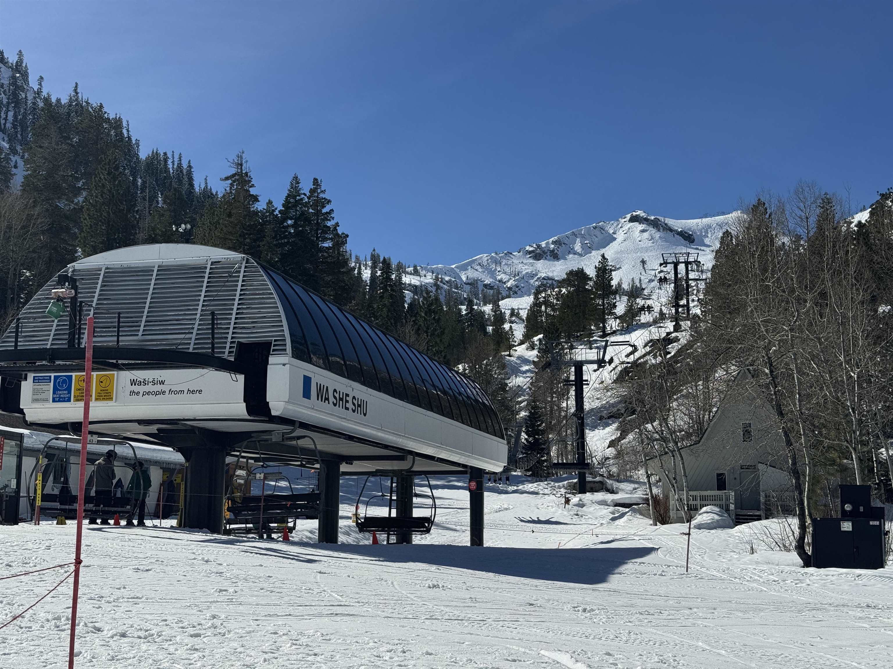 201 Shirley Cyn Road, Unit 302 Olympic Valley, CA 96146 - Photo 23 of 28 a front view of a building with streets and trees