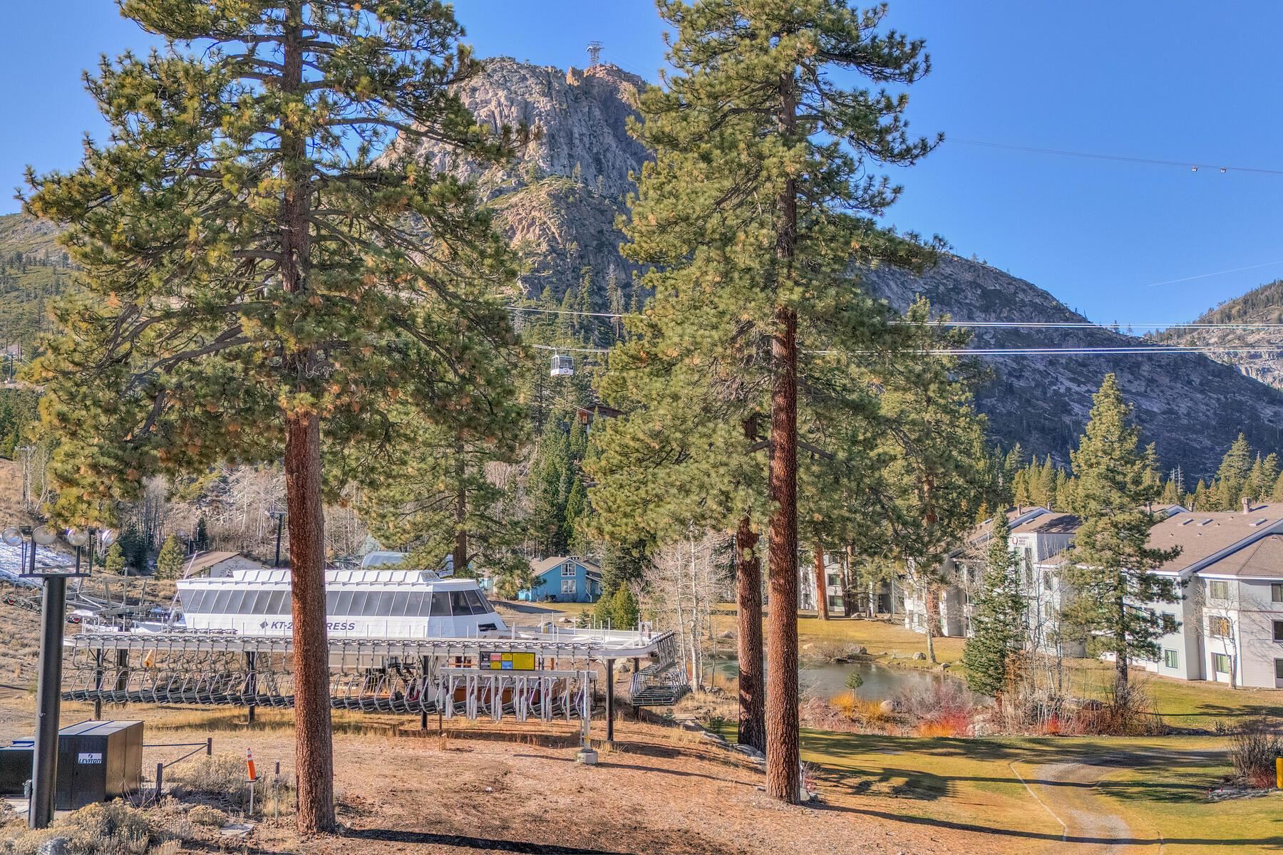 201 Shirley Cyn Road, Unit 302 Olympic Valley, CA 96146 - Photo 27 of 28 a view of a city with large tree