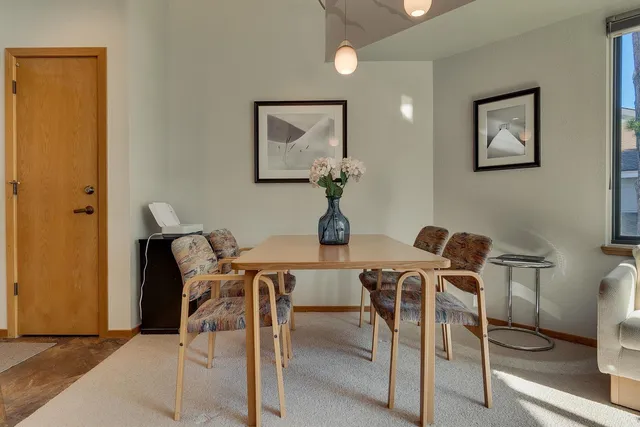 a view of a dining room with furniture