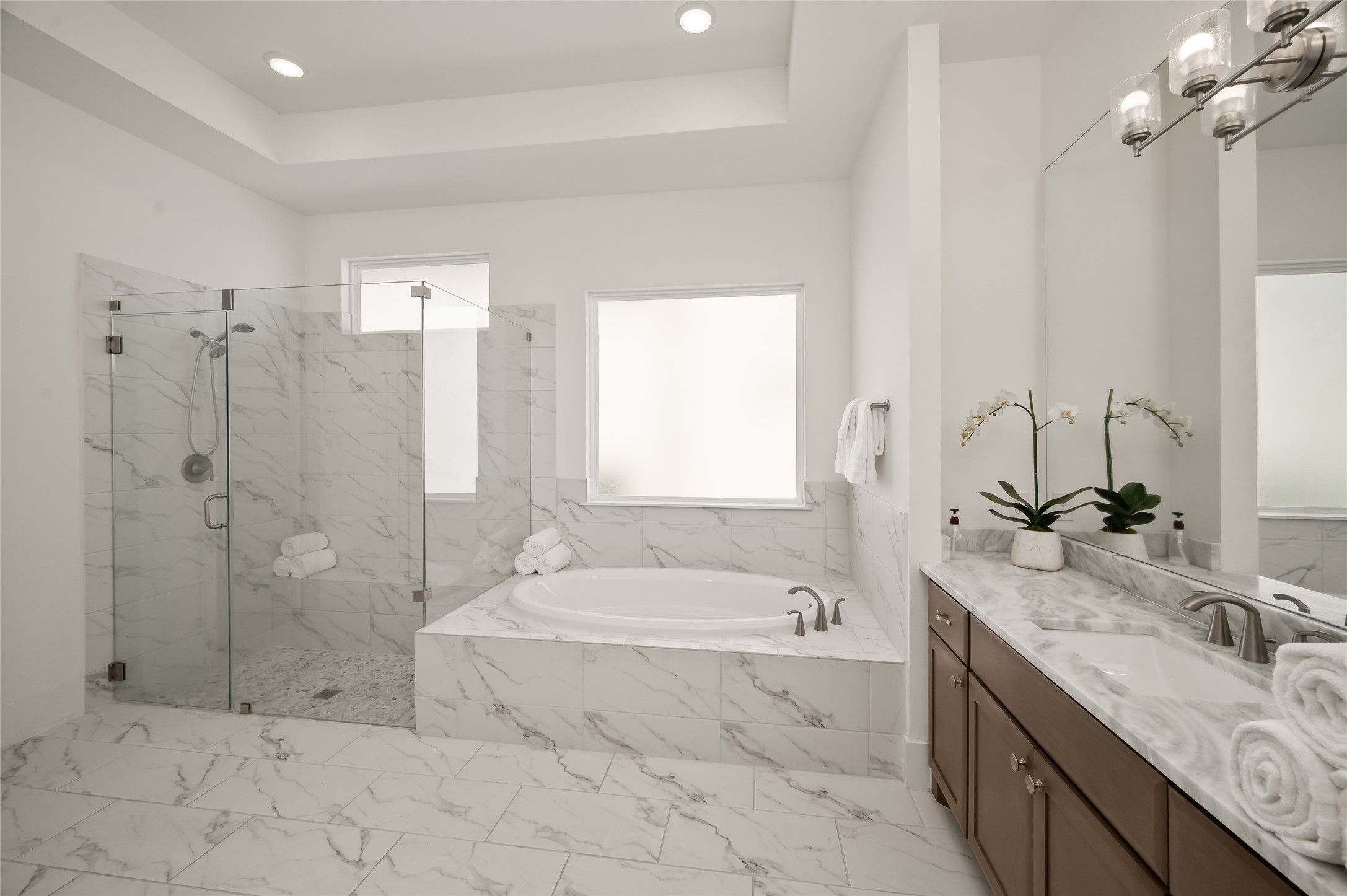 2215 MacArthur Street Houston, TX 77030 - Photo 13 of 33 The primary bathroom is both luxurious and serene.