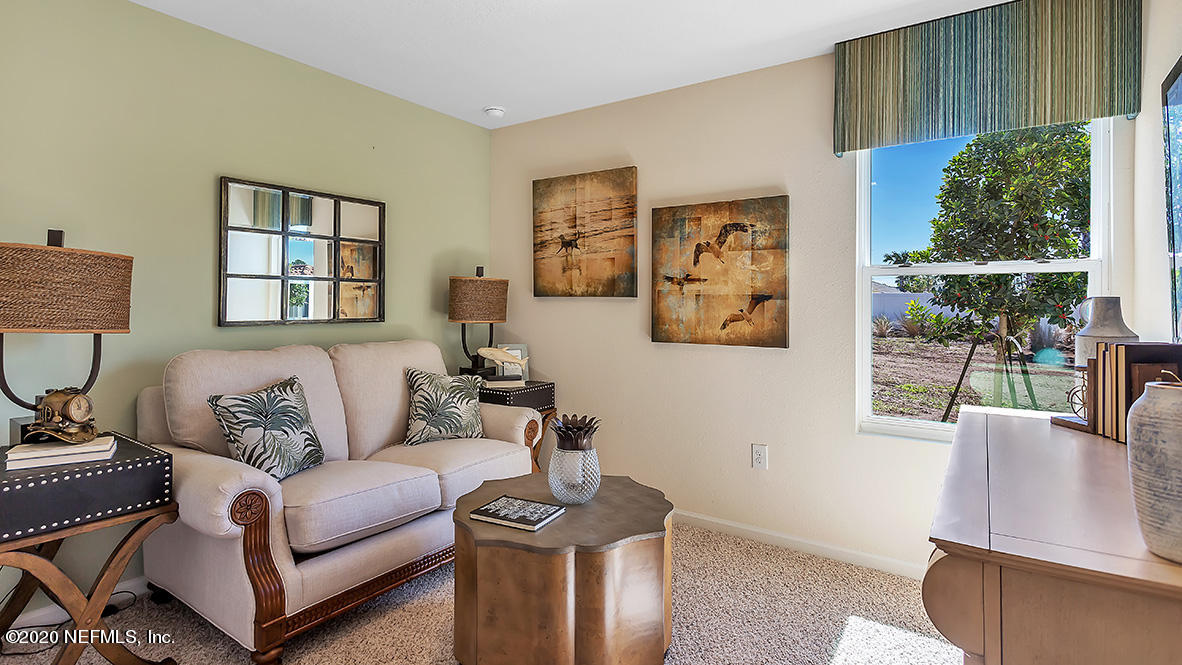 100 Palace Drive St. Augustine, FL 32084 - Photo 14 of 27 a living room with furniture and a window