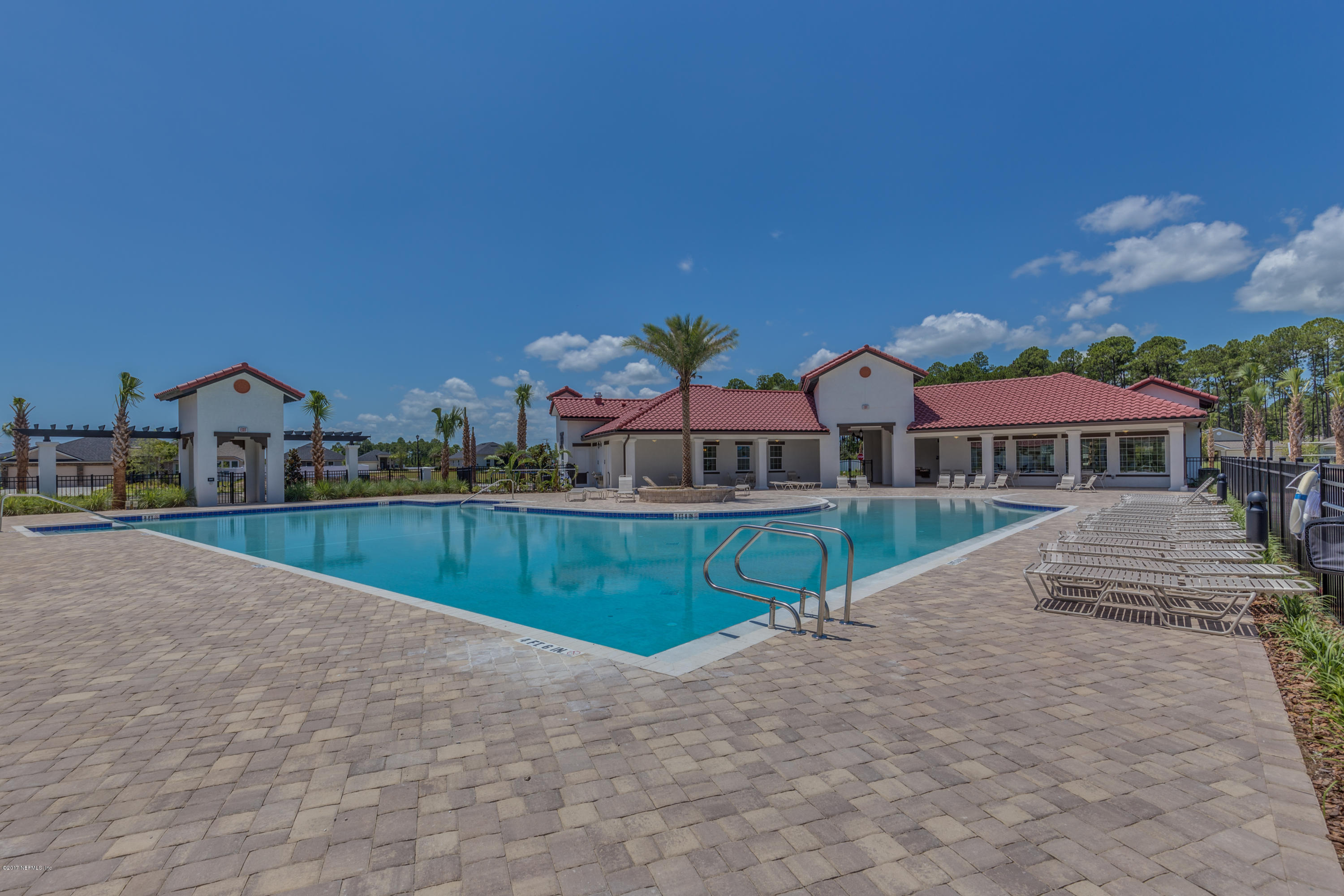 100 Palace Drive St. Augustine, FL 32084 - Photo 22 of 27 a view of houses with an outdoor space and lakeside