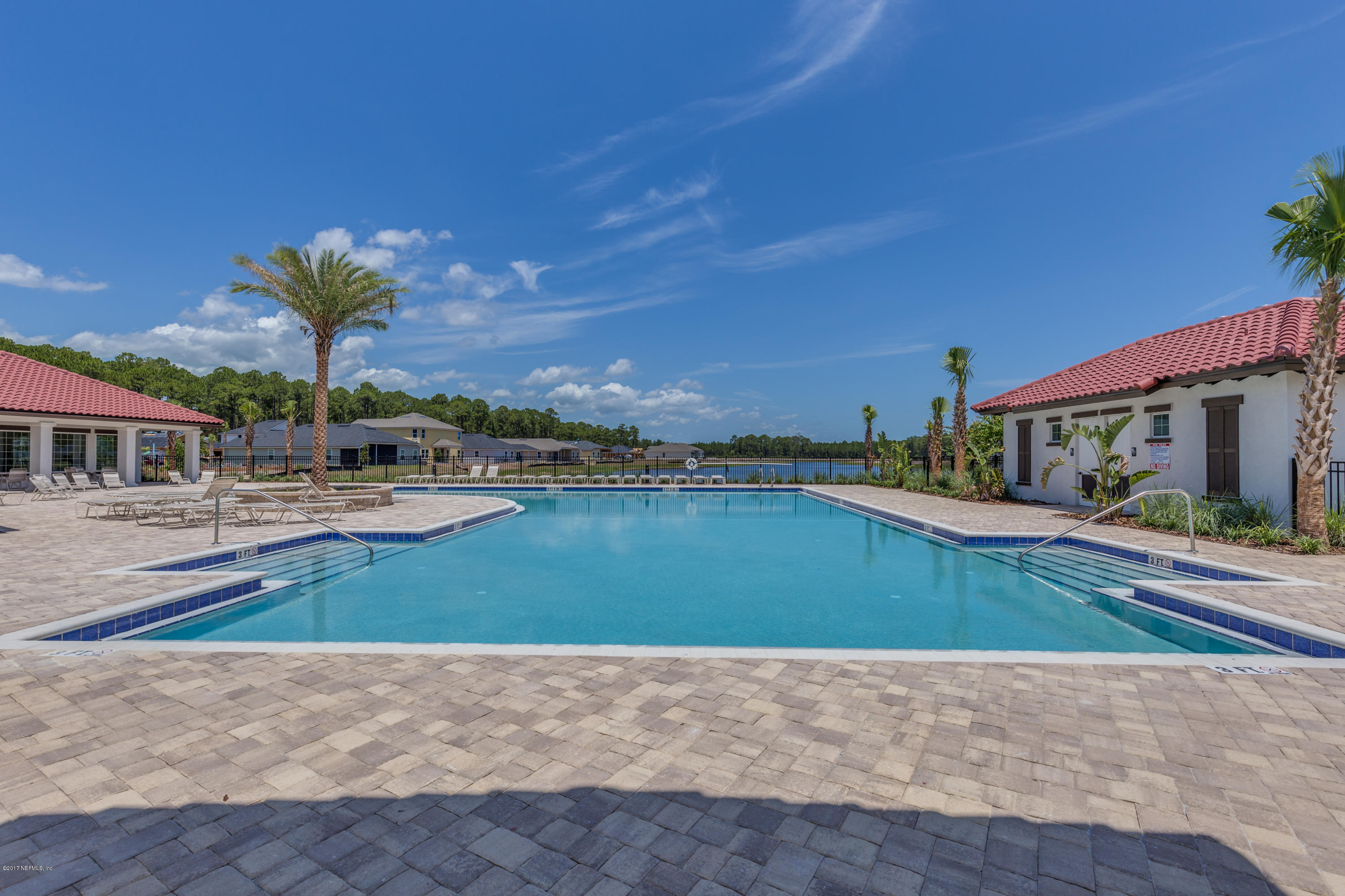 100 Palace Drive St. Augustine, FL 32084 - Photo 23 of 27 a view of a lake with a house in the background