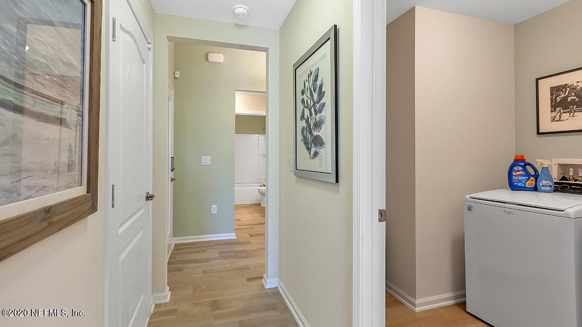 100 Palace Drive St. Augustine, FL 32084 - Photo 3 of 27 a view of a bathroom from a hallway