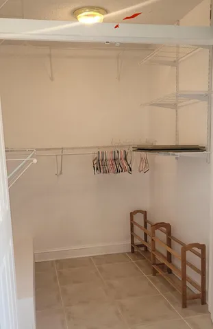 a view of a room with racks on the wall