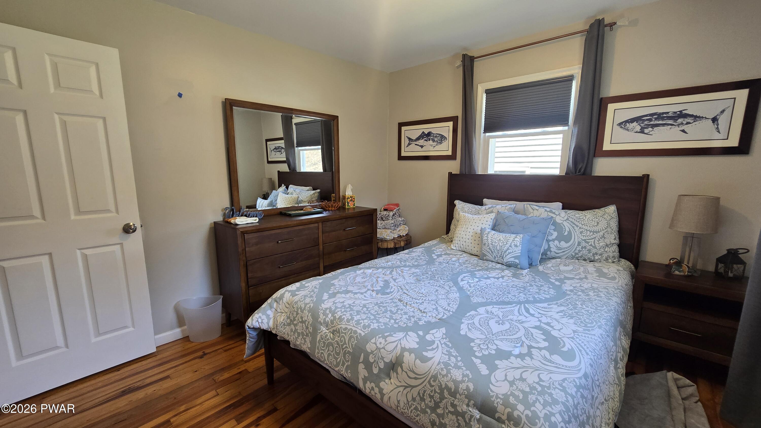 430 Griffith Road Tyler Hill, PA 18469 - Photo 14 of 31 a bedroom with a bed and a window