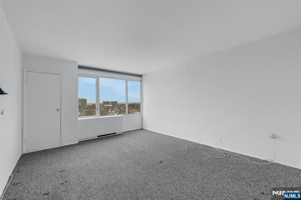 6 Horizon Road, Unit 1508 Fort Lee, NJ 07024 - Photo 33 of 46 a view of an empty room with a window
