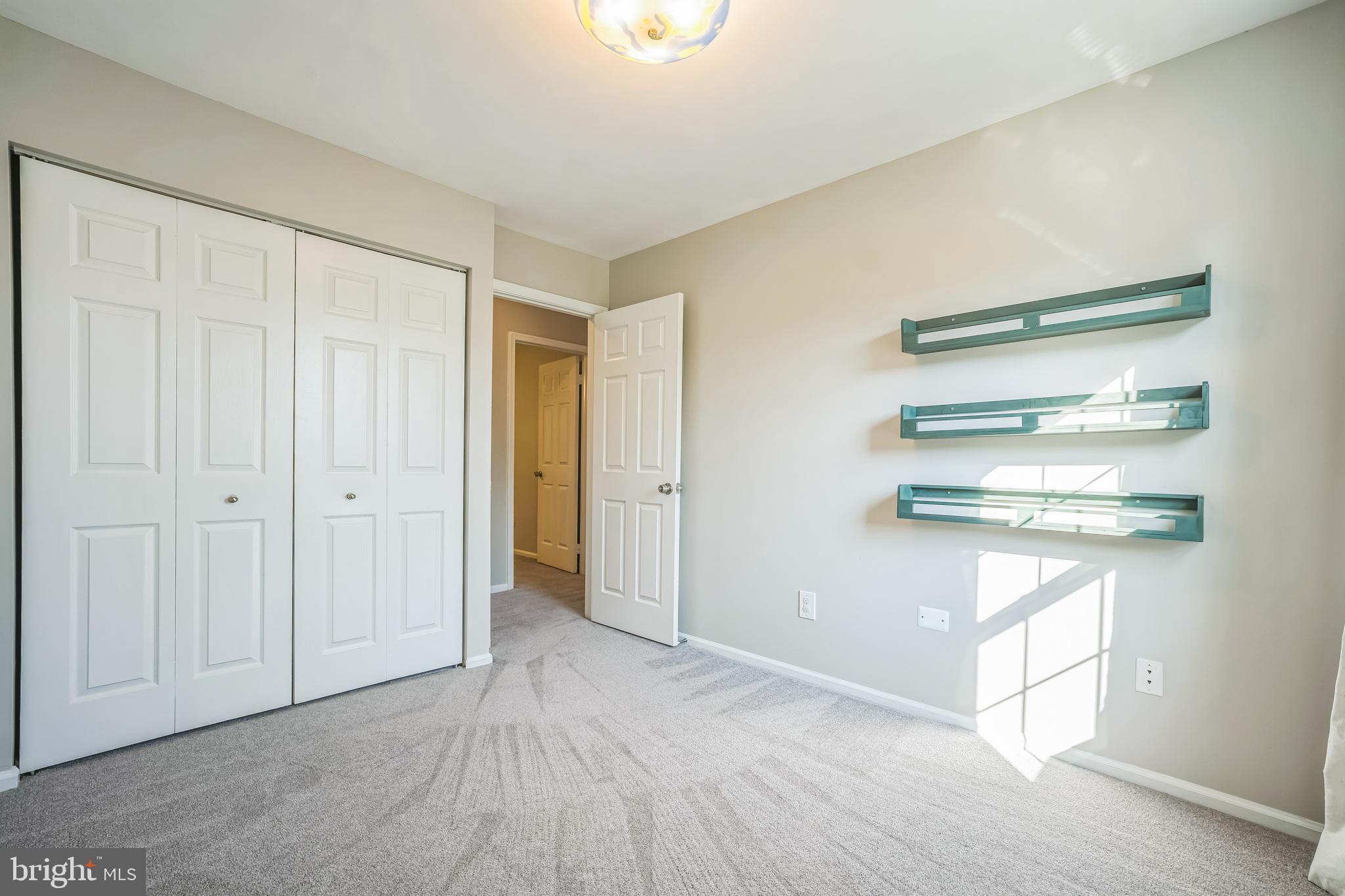 14801 Basingstoke Loop Centreville, VA 20120 - Photo 9 of 28 a view of a kitchen with wooden floor