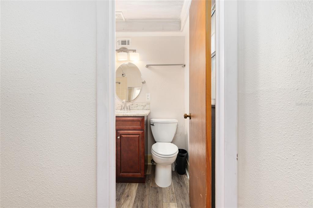 630 Northwest 34th Street Gainesville, FL 32607 - Photo 24 of 84 a bathroom with a toilet and a sink