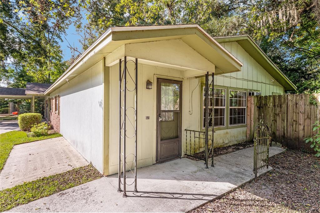 630 Northwest 34th Street Gainesville, FL 32607 - Photo 38 of 84 a view of a house with backyard