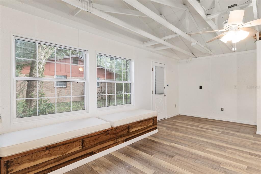 630 Northwest 34th Street Gainesville, FL 32607 - Photo 42 of 84 a view of a room with wooden floor and window