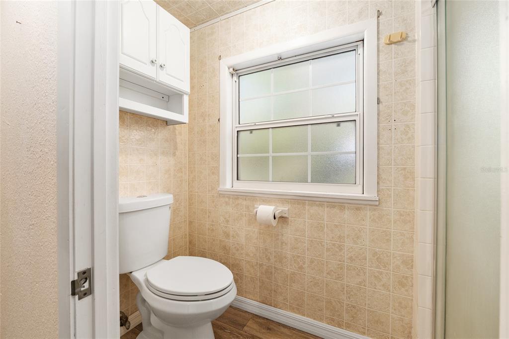 630 Northwest 34th Street Gainesville, FL 32607 - Photo 49 of 84 a bathroom with a toilet and a sink