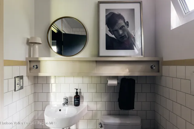a room with furniture and a shelf with wooden floor
