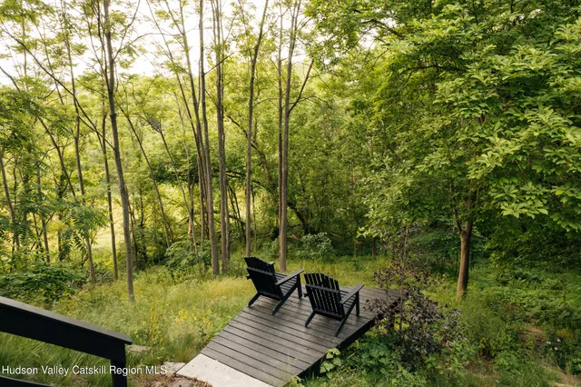 a view of a lake with a yard