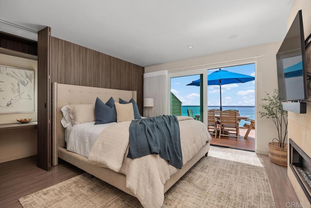 1856 Parliament Road Encinitas, CA 92024 - Photo 22 of 42 a bed room with a bed and a large window
