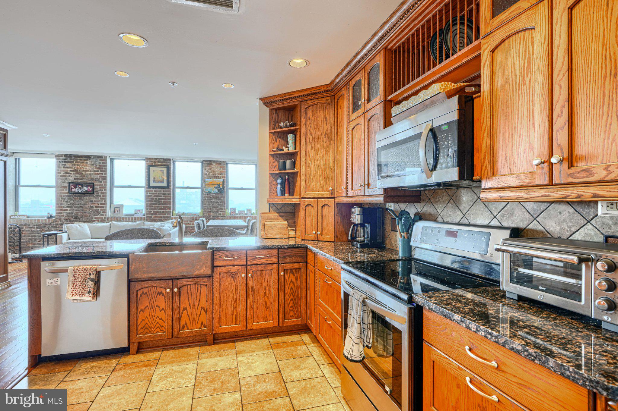 1000 Fell Street, Unit 606 Baltimore, MD 21231 - Photo 11 of 56 Warm wood tones meet modern elegance.