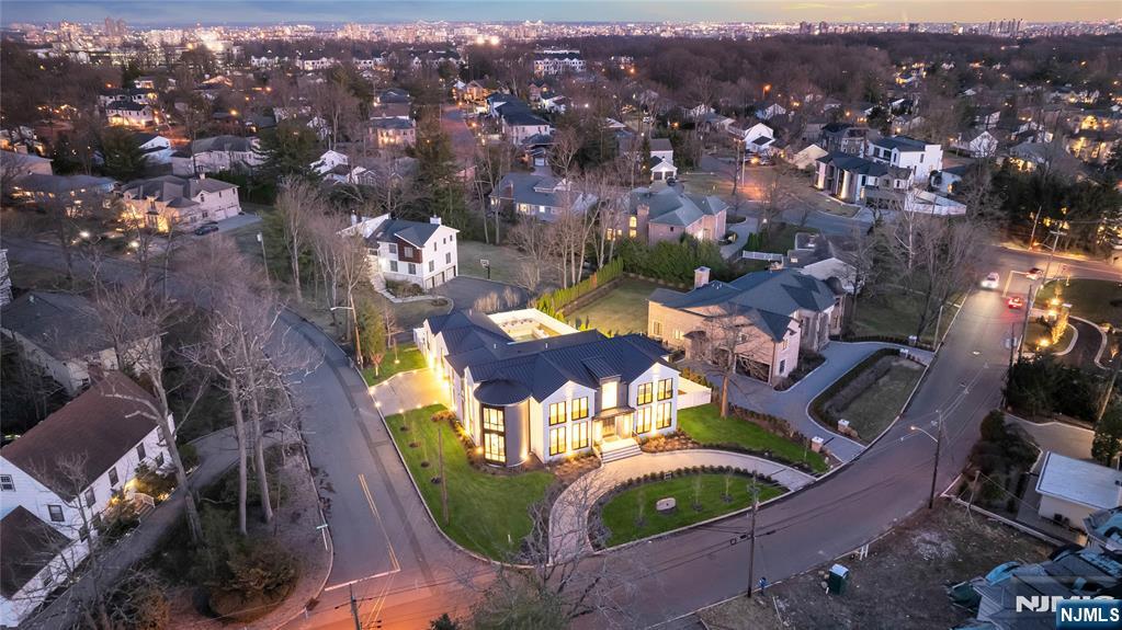 11 Roberts Road Englewood Cliffs, NJ 07632 - Photo 49 of 50 an aerial view of a house with yard swimming pool and outdoor seating