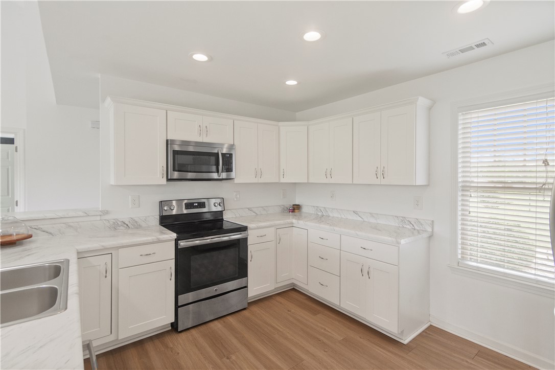 2900 Highway 187 Anderson, SC 29626 - Photo 12 of 41 A well-appointed kitchen features stainless steel appliances, abundant cabinetry, and a bright window.