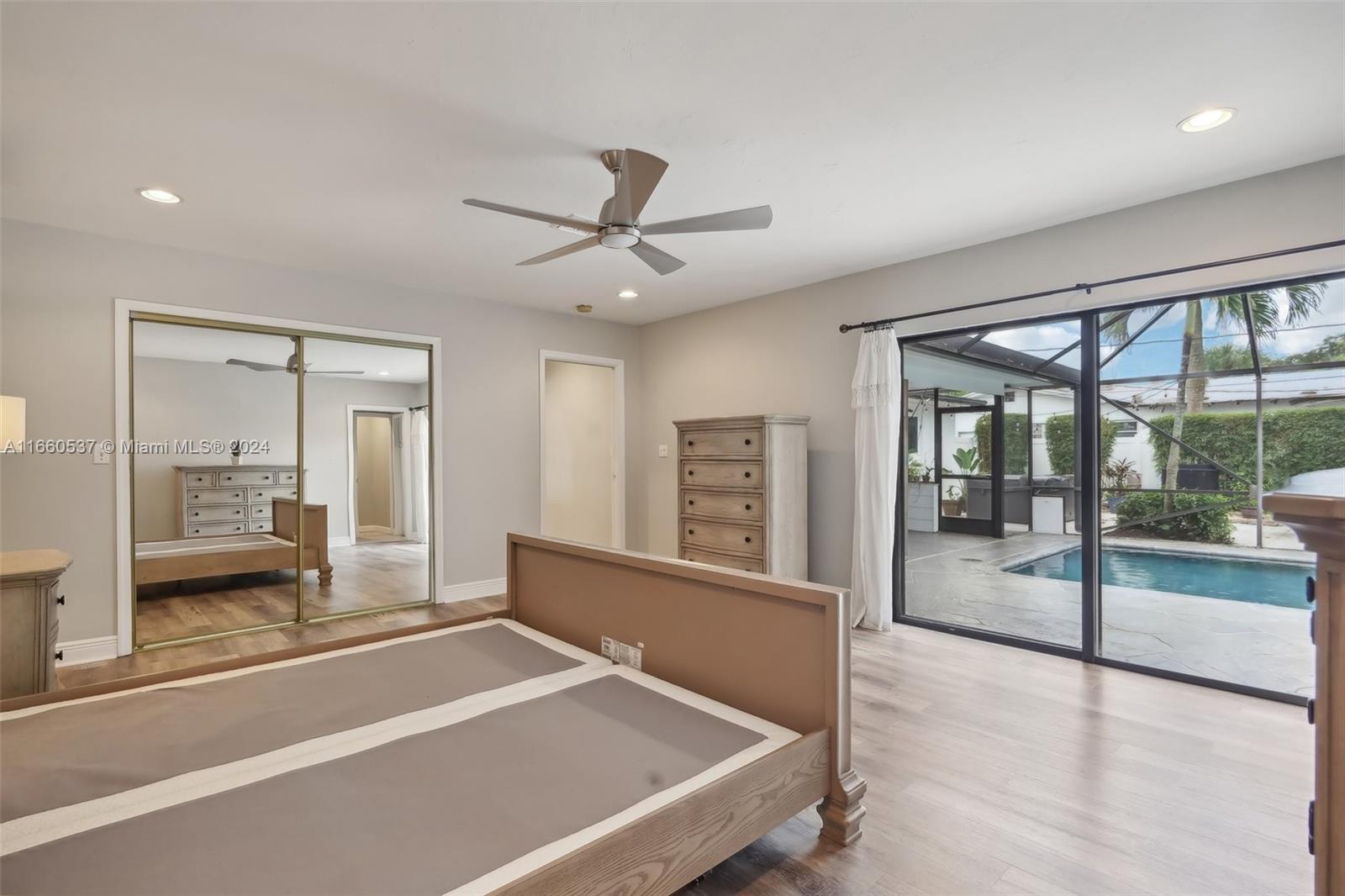 1164 Southwest 14th Street Boca Raton, FL 33486 - Photo 23 of 54 Main primary suite with sliders out to pool area