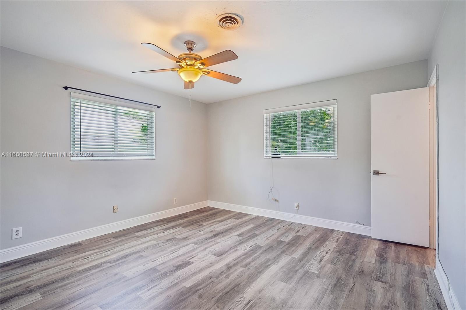 1164 Southwest 14th Street Boca Raton, FL 33486 - Photo 33 of 54 2nd bedroom suite with two windows & ceiling fan