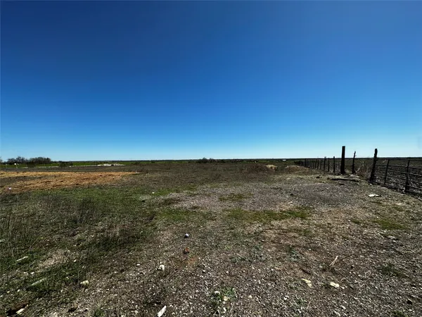a view of an ocean and mountain