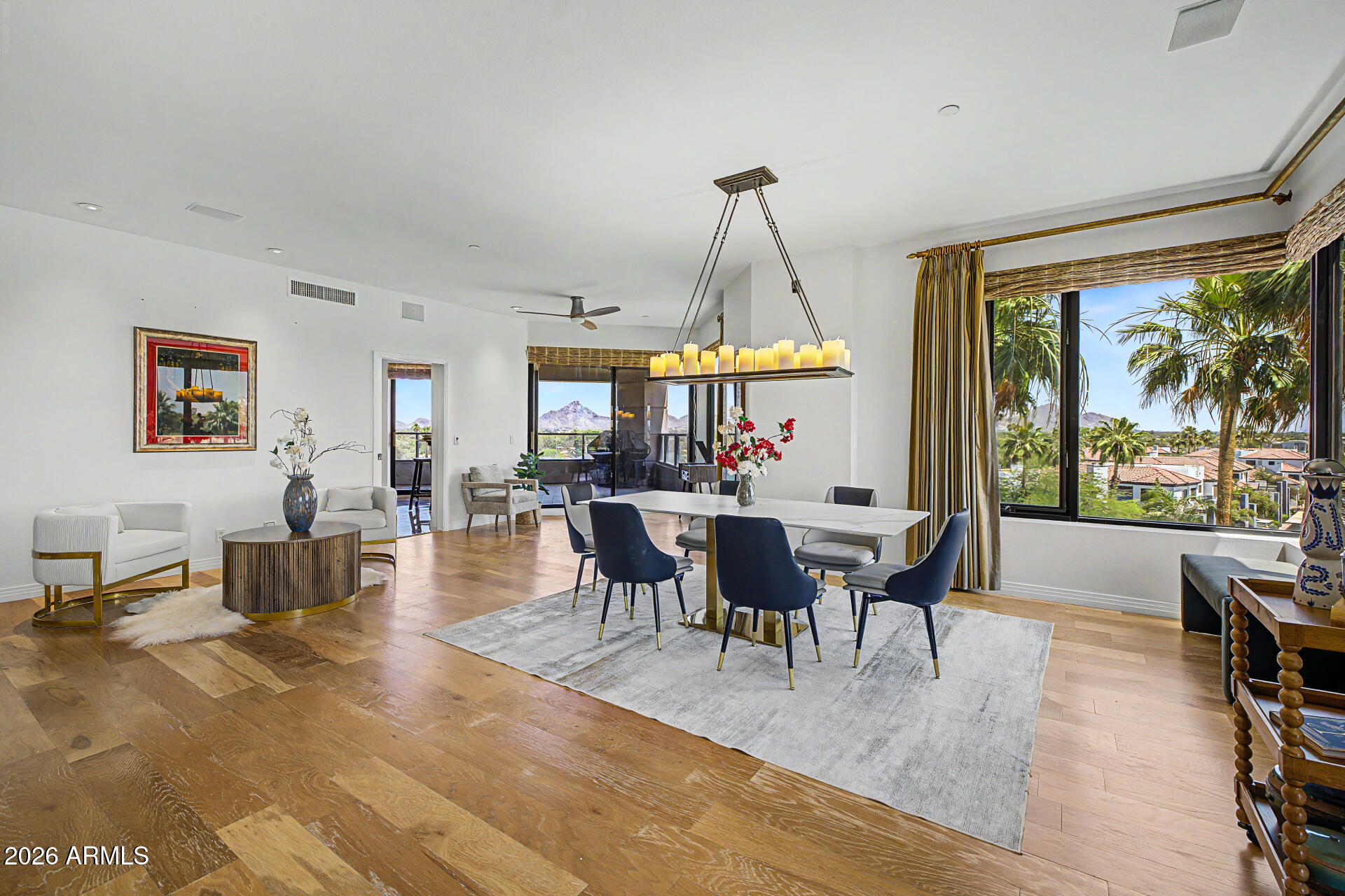 1040 East Osborn Road, Unit 402 Phoenix, AZ 85014 - Photo 20 of 96 a view of a dining room with furniture window and outside view
